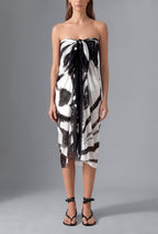 Butterfly Pareo in Black & White worn as a strapless beach wrap – front view