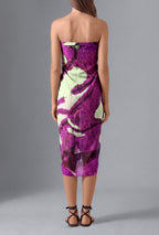 Back view of model wearing the Isabella Kron Butterflywing Pareo in purple, crafted in Italy from lightweight 100% cotton voile.