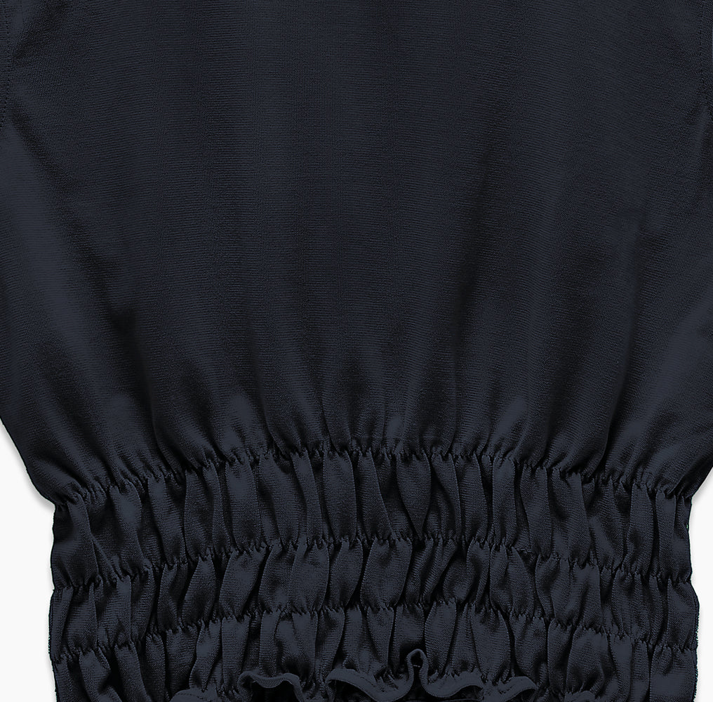 Close-up of black fabric and sleeve detail on Holborn Top