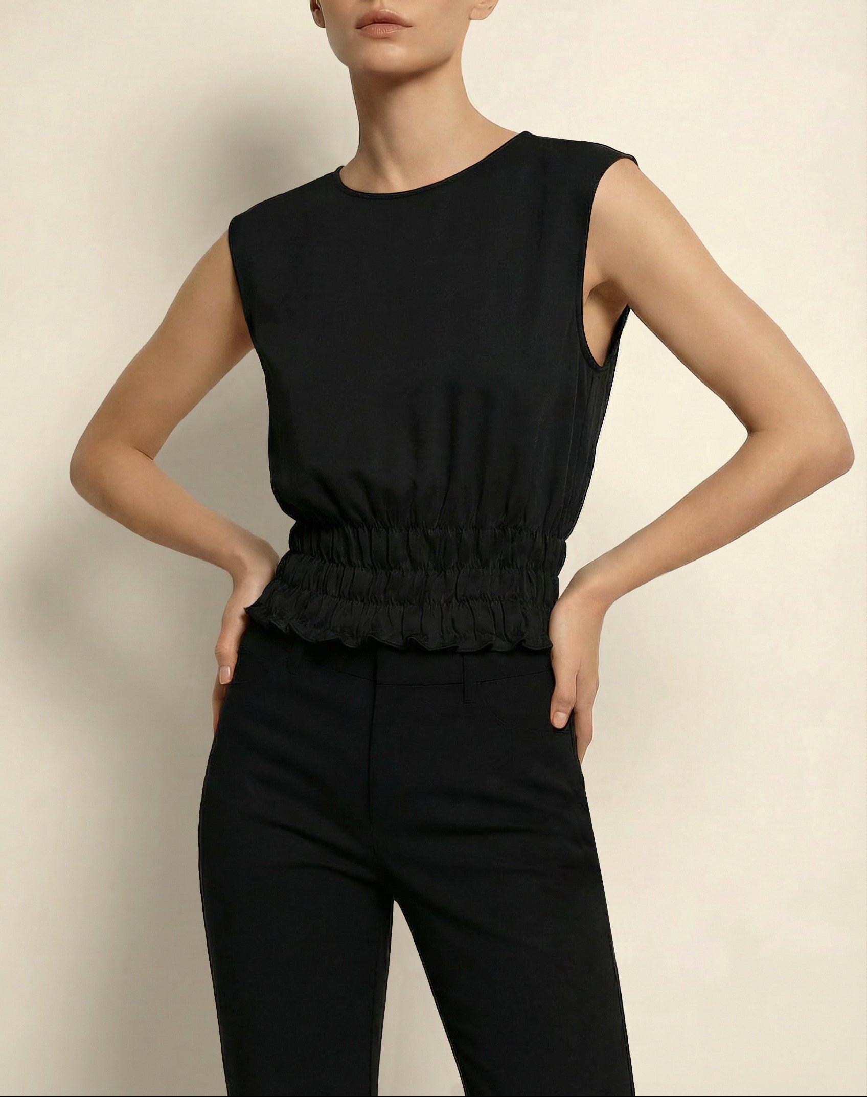 Model wearing black Holborn Top by Isabella Kron – front view