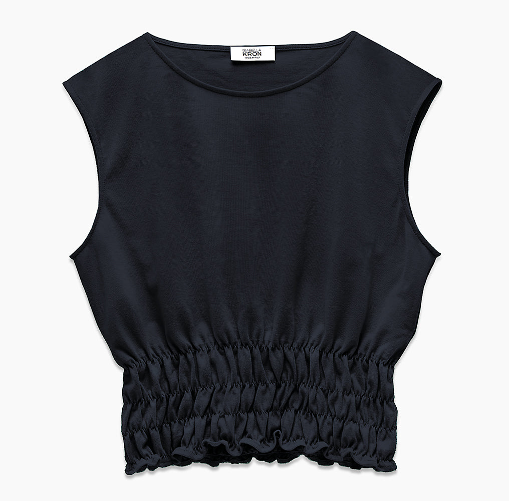 Close-up of black fabric and sleeve detail on Holborn Top