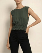 Model wearing green Holborn Top by Isabella Kron – front view