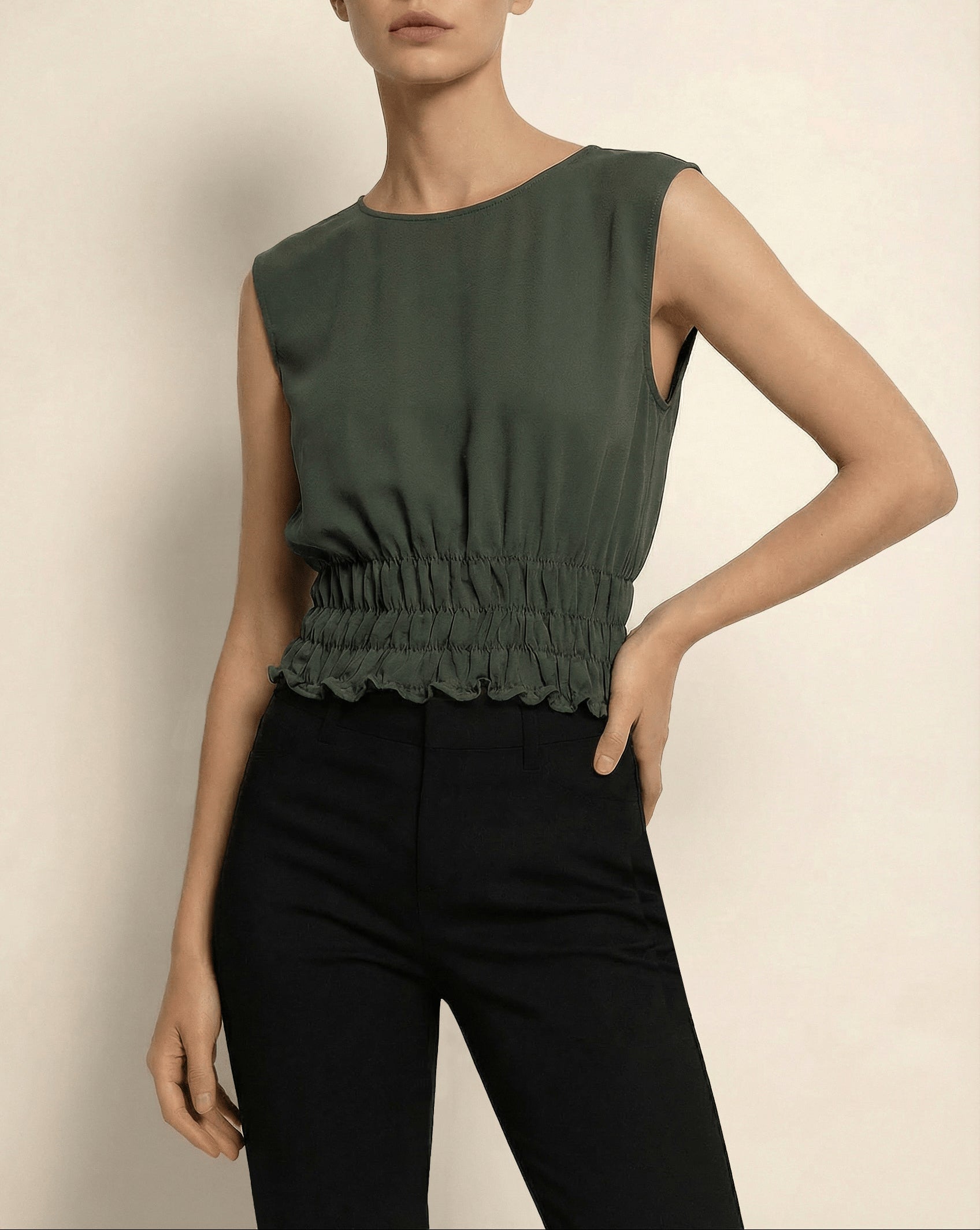 Model wearing green Holborn Top by Isabella Kron – front view