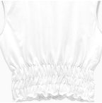 Close-up of white fabric and sleeve detail on Holborn Top