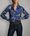 Front view of Isabella Kron Linda Shirt in black iris print, button-down cotton with bold floral motif and pointed collar