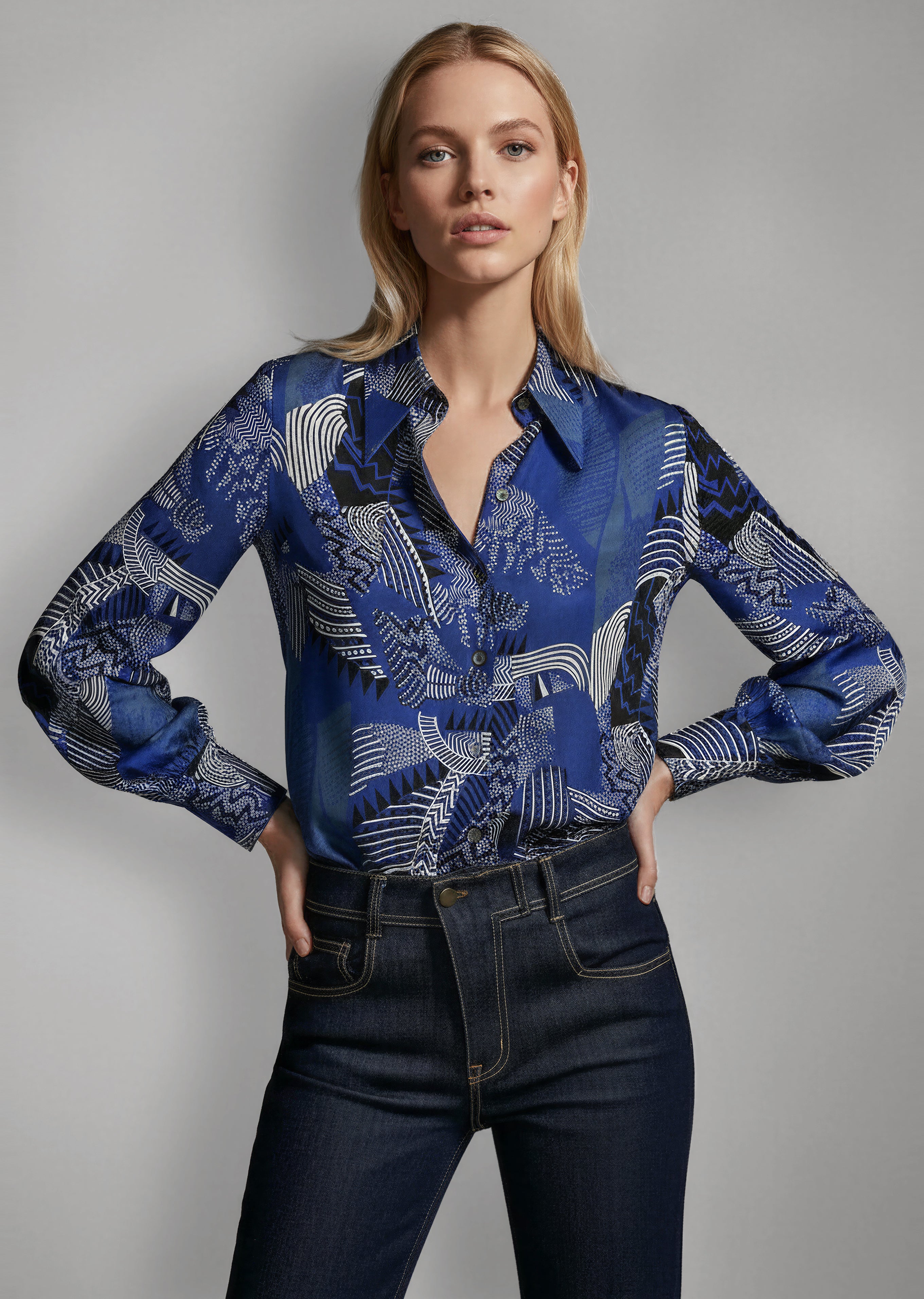 Front view of Isabella Kron Linda Shirt in black iris print, button-down cotton with bold floral motif and pointed collar
