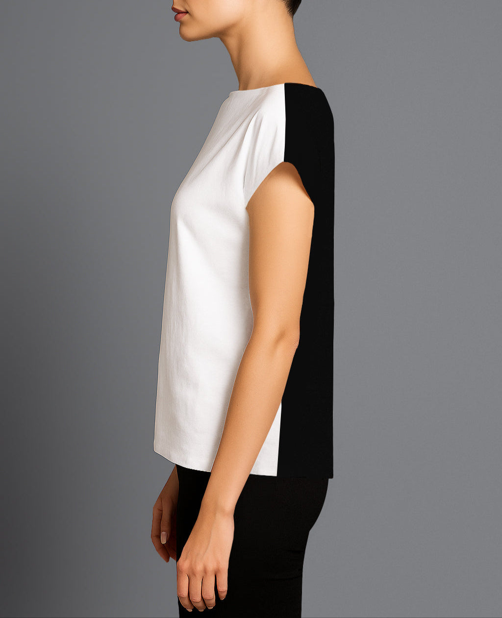 Side view of Roxanne T-Shirt – white and black on a modern woman