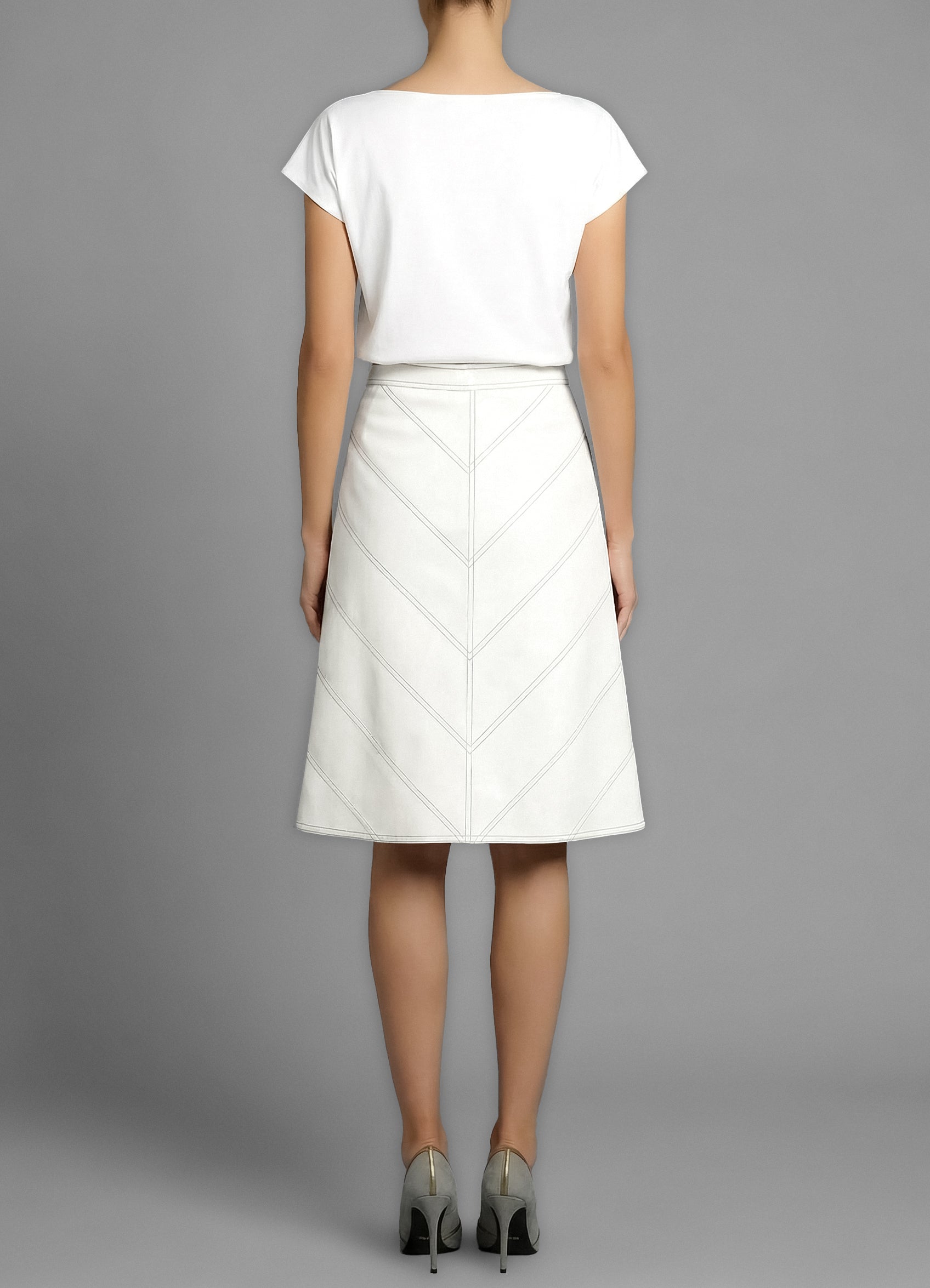 Model wearing Warwick White Cotton Drill Skirt – effortless everyday elegance by Isabella Kron