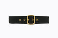 Front flat‑lay view of Isabella Kron Blix Belt in black webbing with leather trim, featuring brass buckle and smooth texture