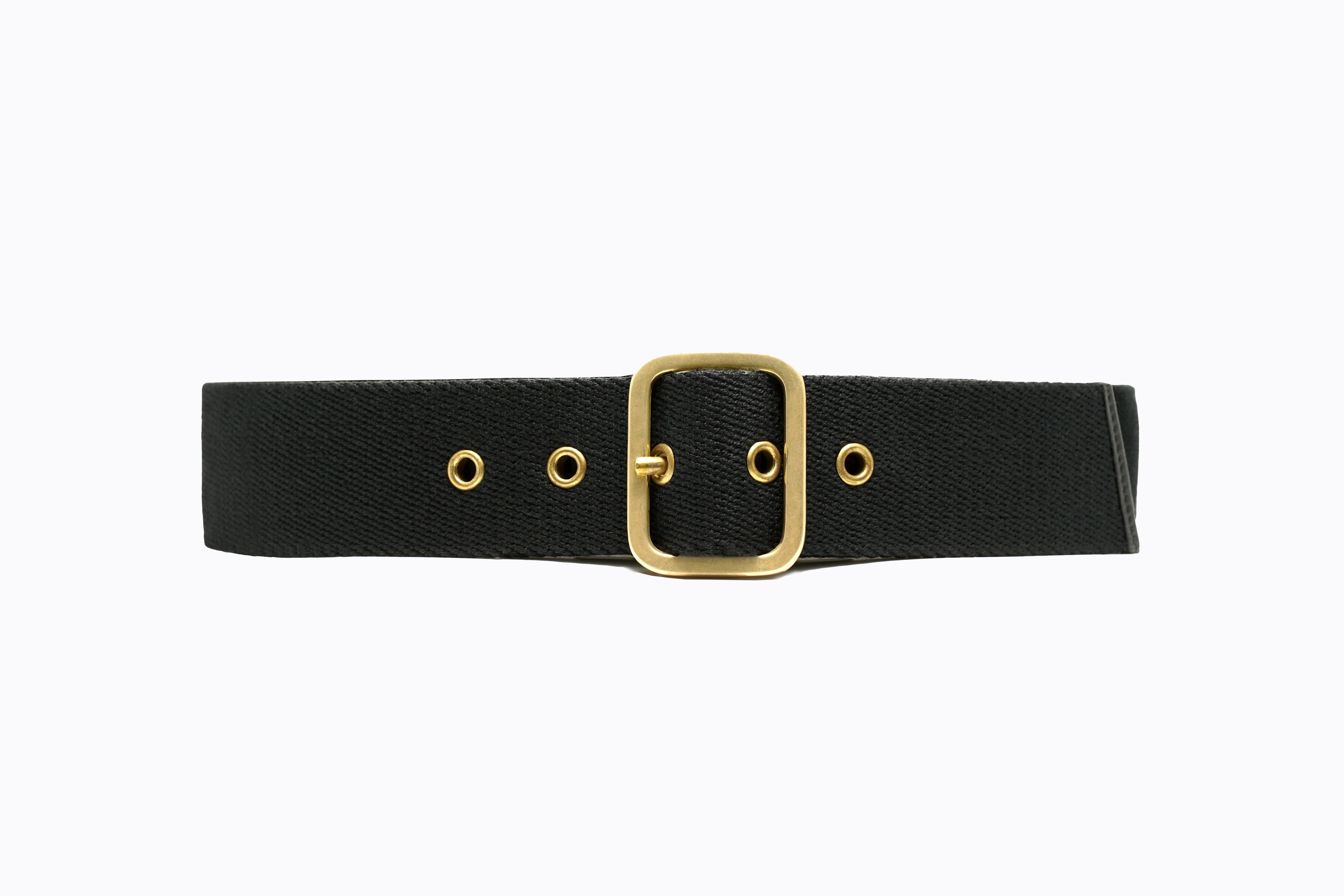 Front flat‑lay view of Isabella Kron Blix Belt in black webbing with leather trim, featuring brass buckle and smooth texture