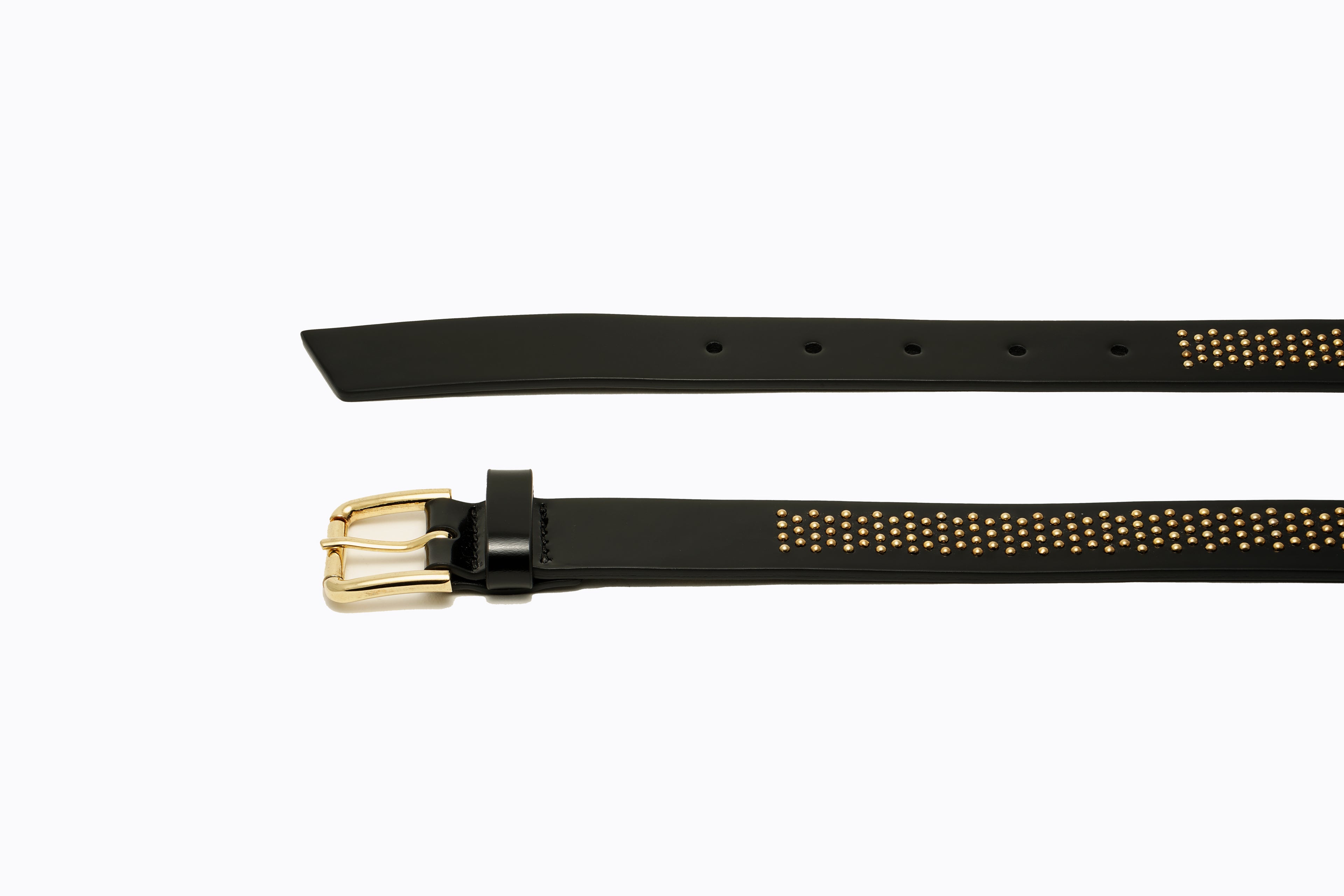 Side angle view of Brea Belt in black leather, highlighting belt thickness, gold rectangular buckle, and studded detailing along strap