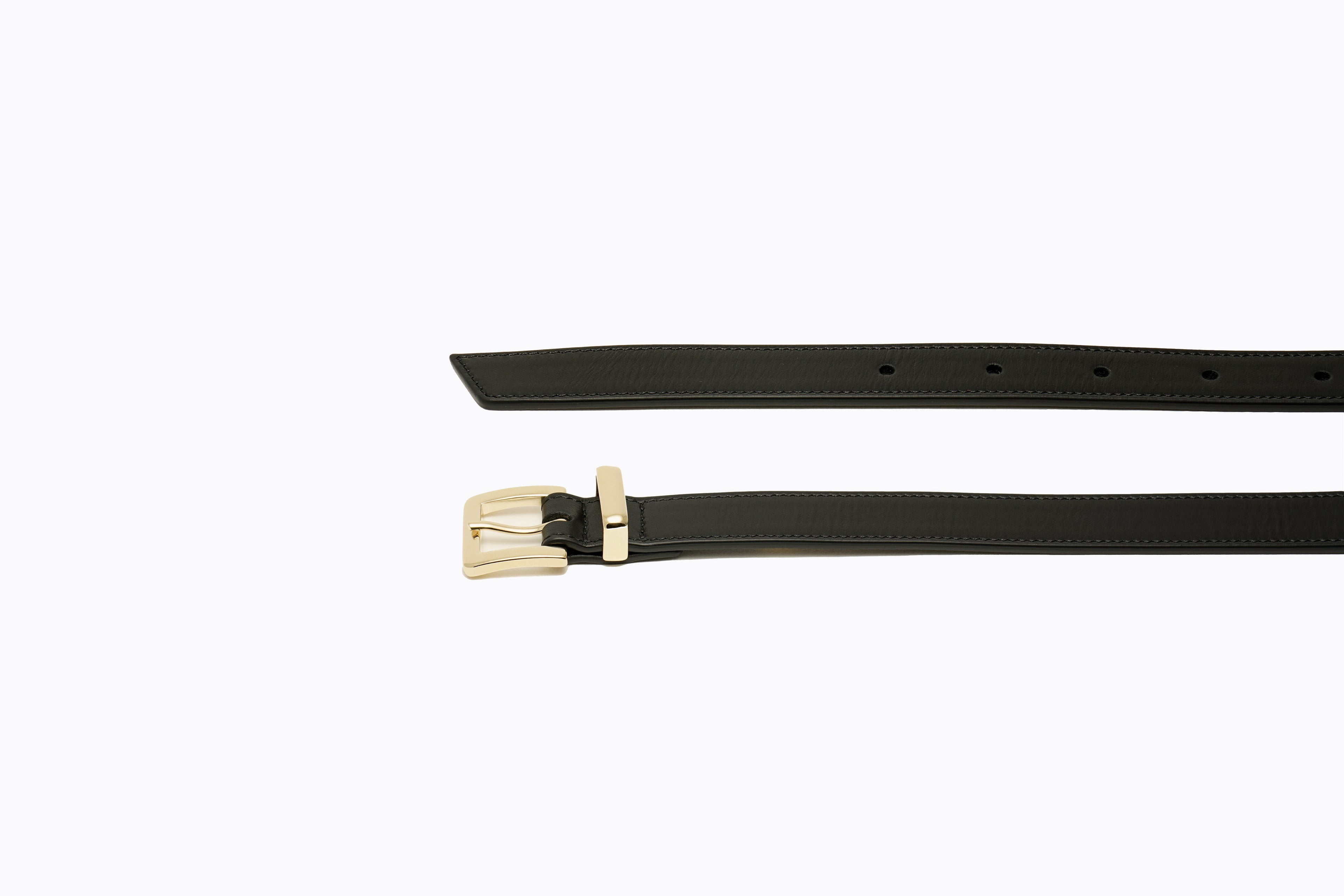 Close-up of sculptural gold buckle and fine-grain black leather on Isabella Kron Brylee Belt, highlighting craftsmanship