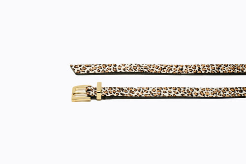 Side angle view of Brylee Belt in Kamari leopard haircalf, highlighting belt width and smooth profile of polished buckle