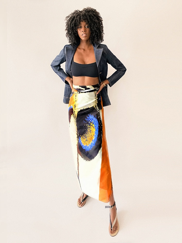 Model wearing Butterfly Wing Pareo in orange – lightweight beach cover-up Voile