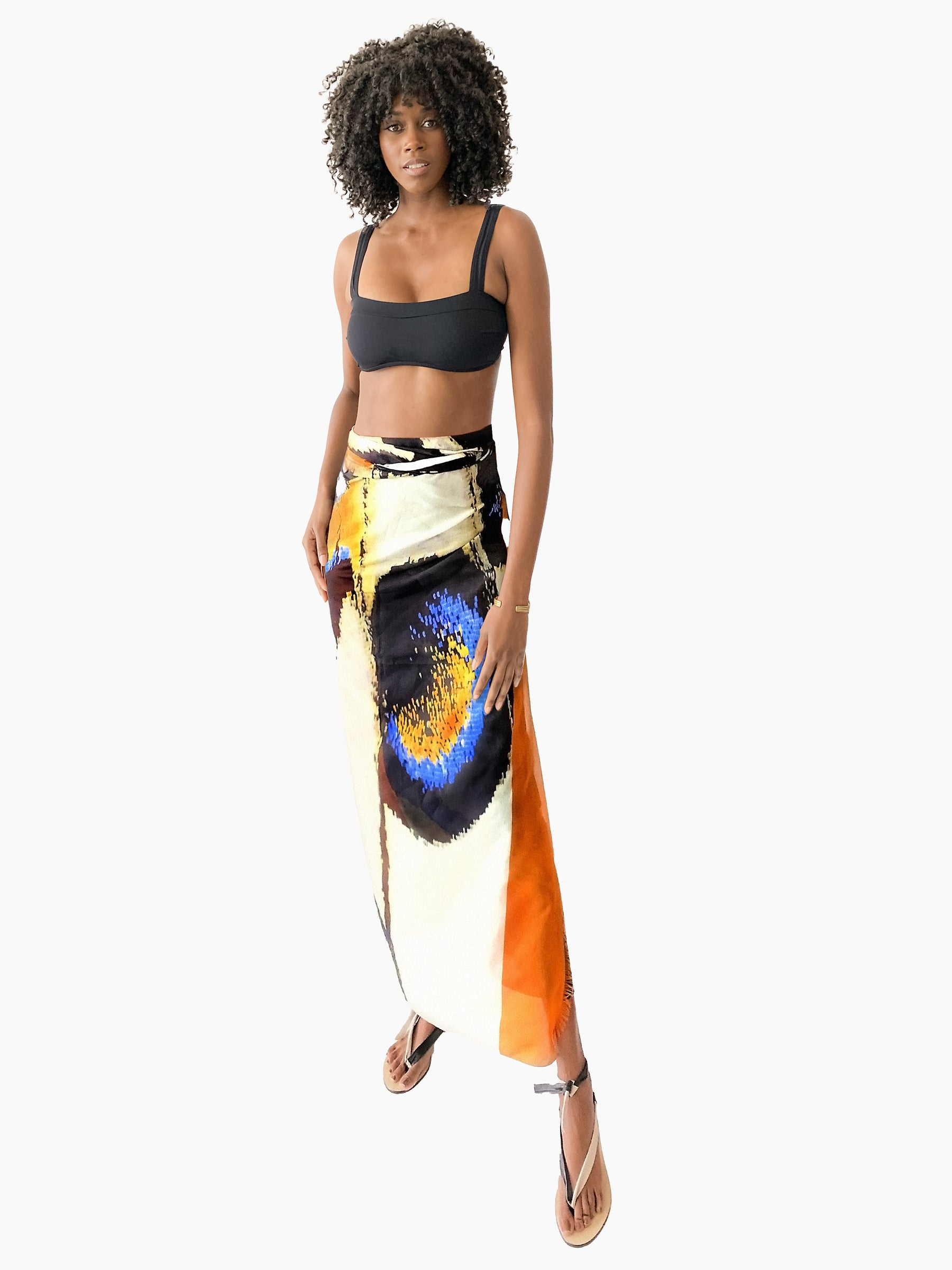 Model wearing Butterfly Wing Pareo in orange – lightweight beach cover-up