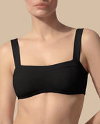 Isabella Kron black bandeau bikini top Italian luxury swimwear clean minimal design close up
