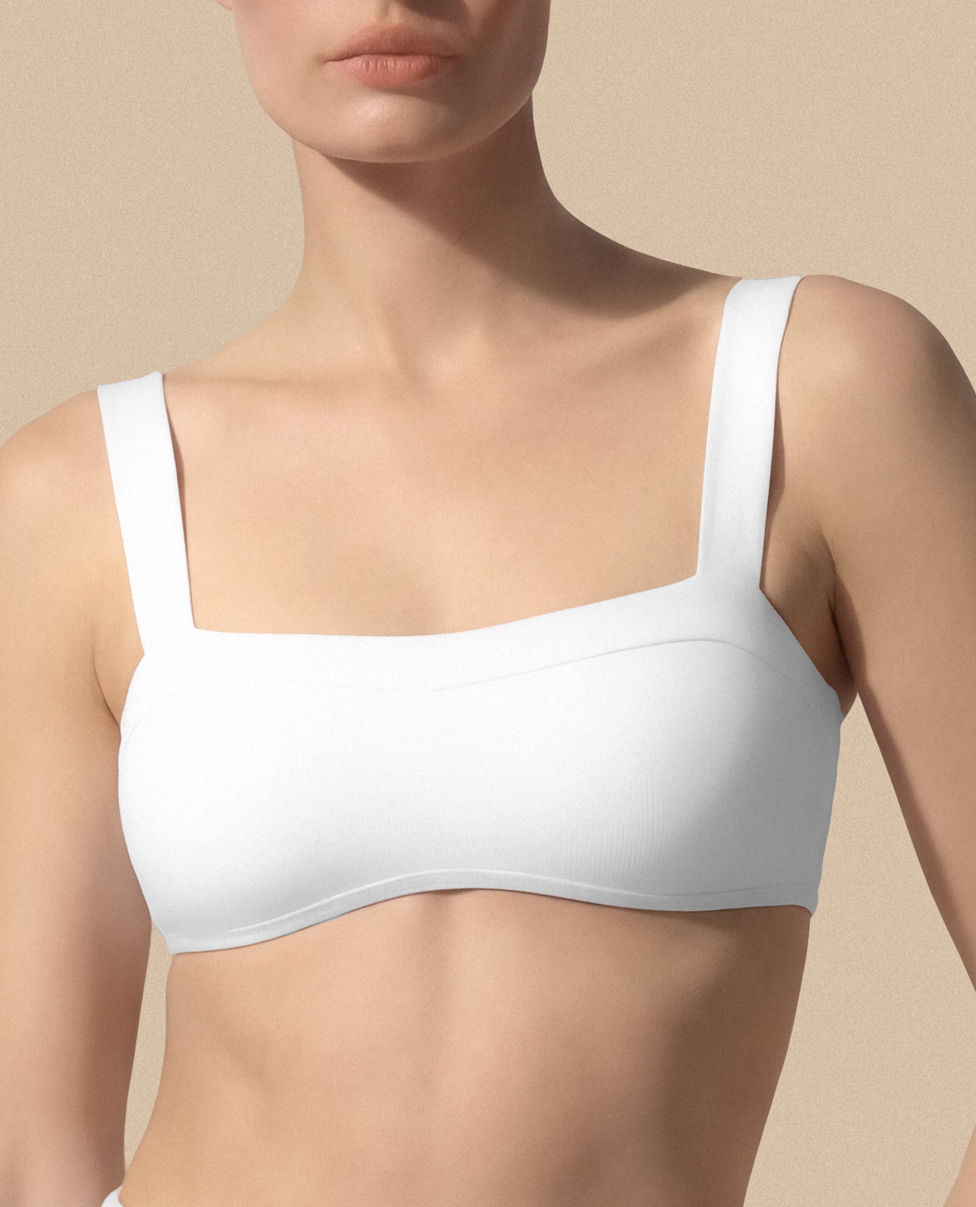 Isabella Kron white swimwear bandeau top premium fabric minimalist style close up