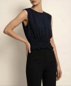 Model wearing Holborn Top in multi-color – expressive, modern style