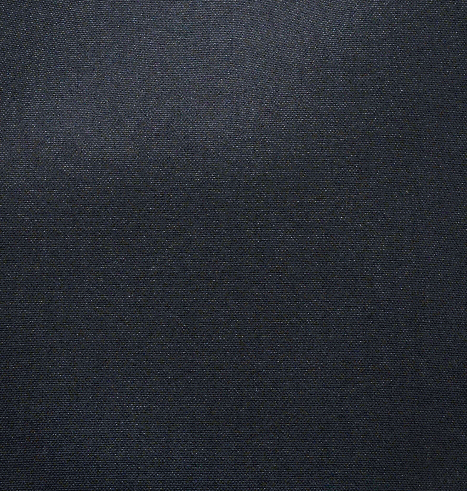 Close-up of Ibbie Bag in black canvas – fine texture, contrast stitching, and elegant hardware details