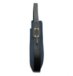 Side view of Ibbie Bag in blue leather – clean lines and polished gold hardware on premium leather