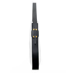 Side view of Ibbie Bag in white leather – elegant silhouette with clean lines and gold hardware