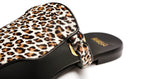 Close-up of Ilka Mini Sandal in brown – premium haircalf texture and refined gold hardware detail