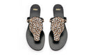 Profile view of Ilka Mini Sandal – brown suede base with leopard-print haircalf strap, minimalist silhouette