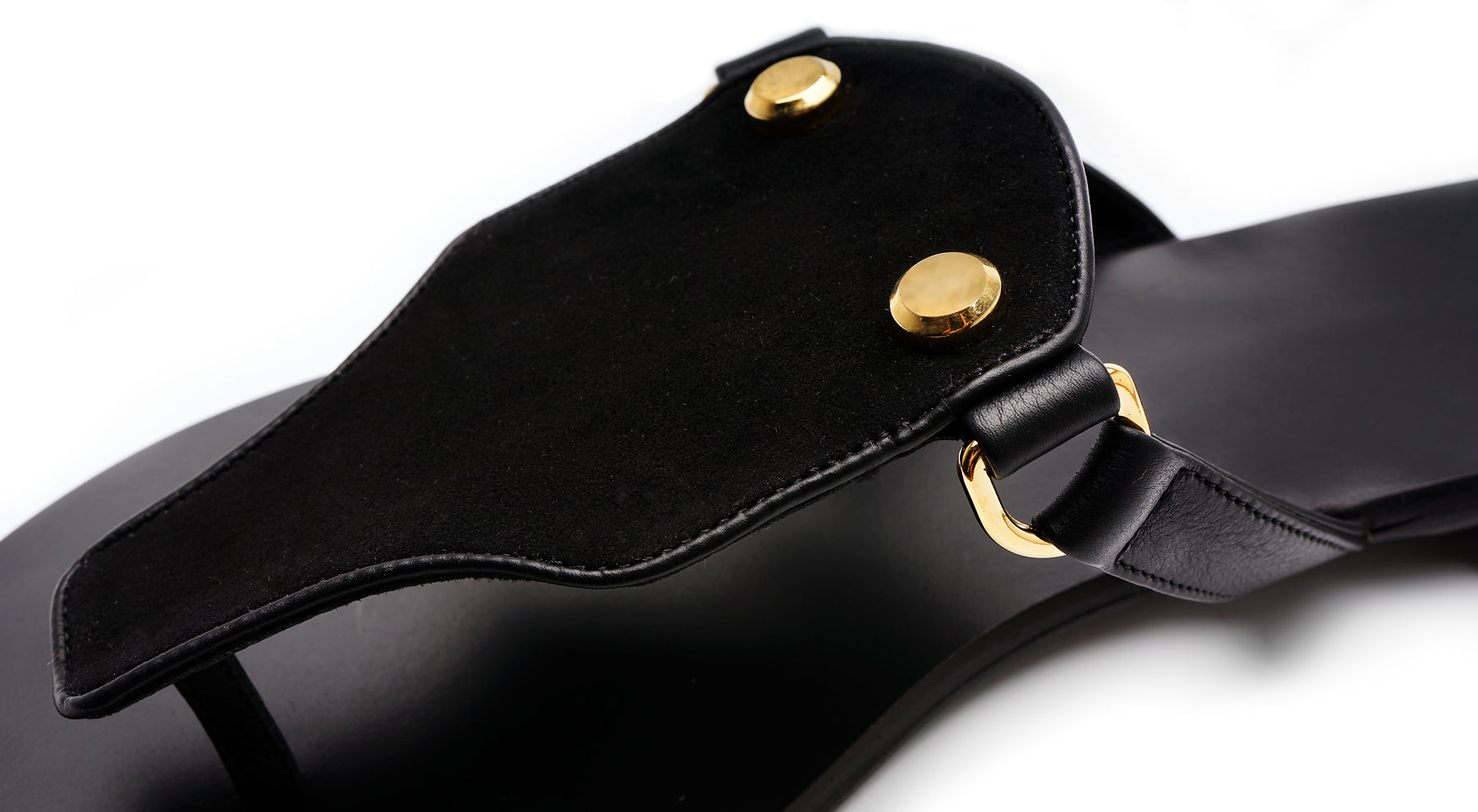 Close-up of black suede texture and slim strap detail – Izzy Sandal by Isabella Kron