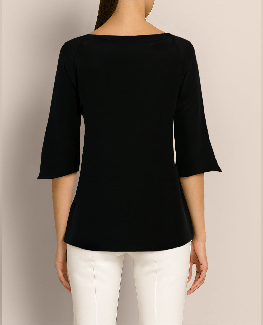 Back view of black Janis Top styled on model