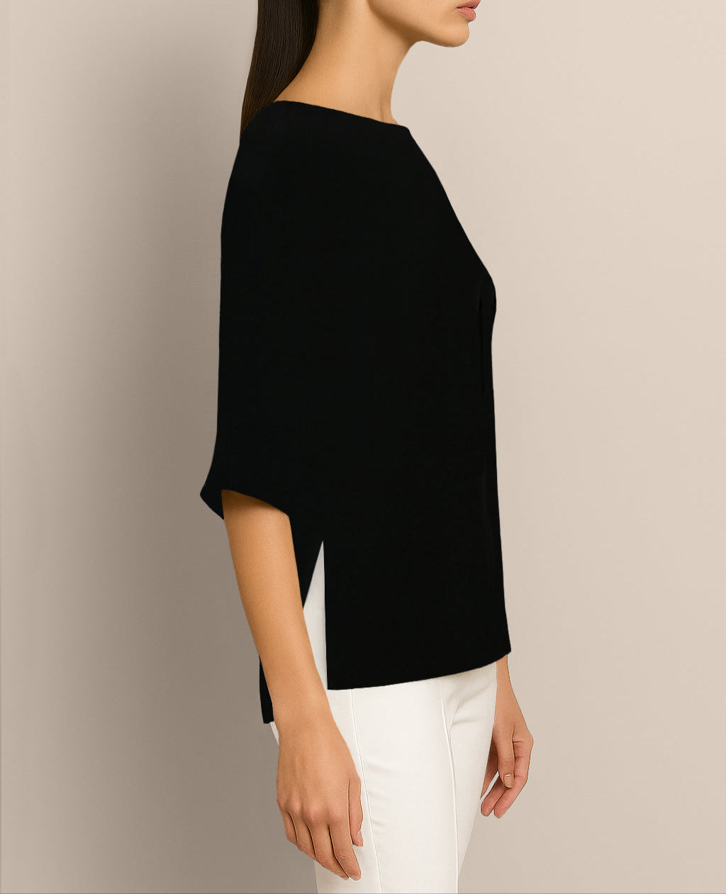 Model wearing Isabella Kron’s black Janis Top – side profile