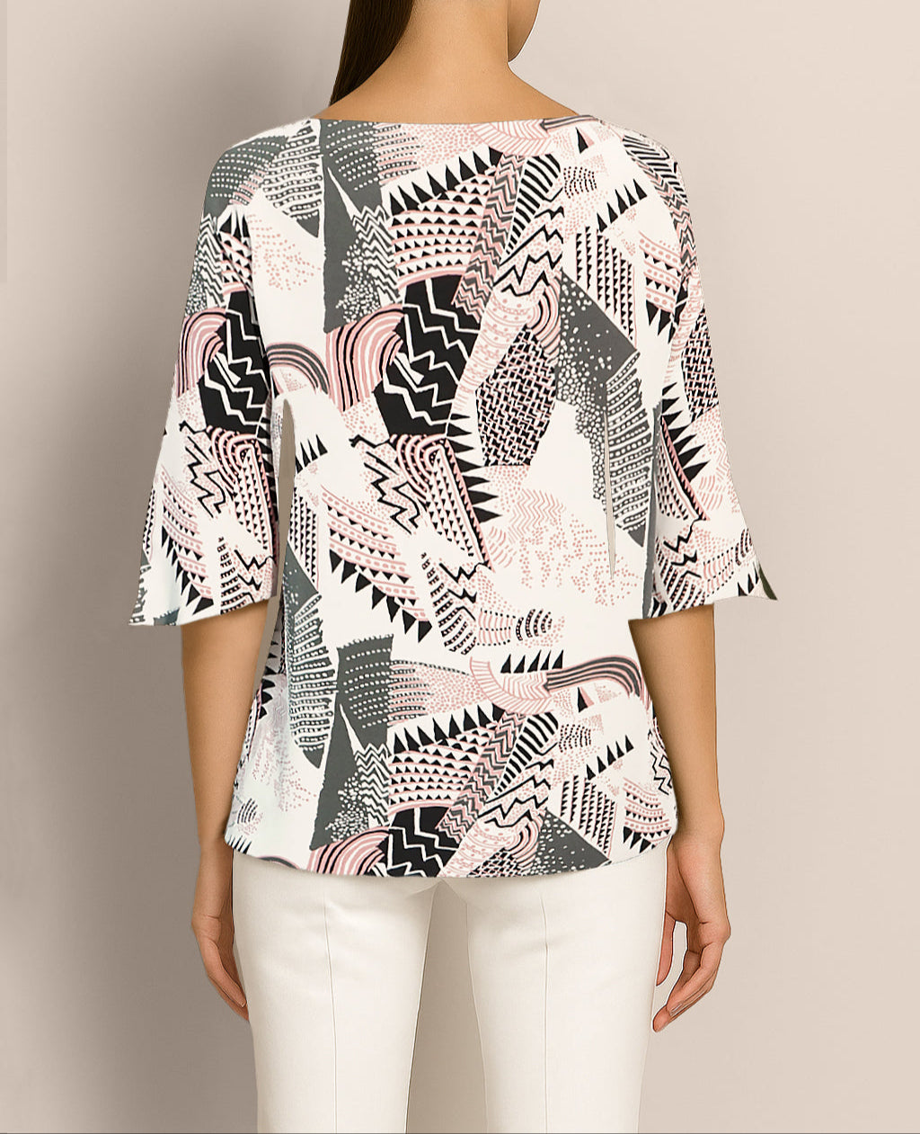 Back view of Janis Top in pink pattern – relaxed fit and elegant detail