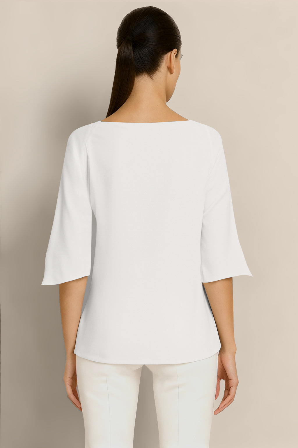 Back view of white Janis Top styled on model