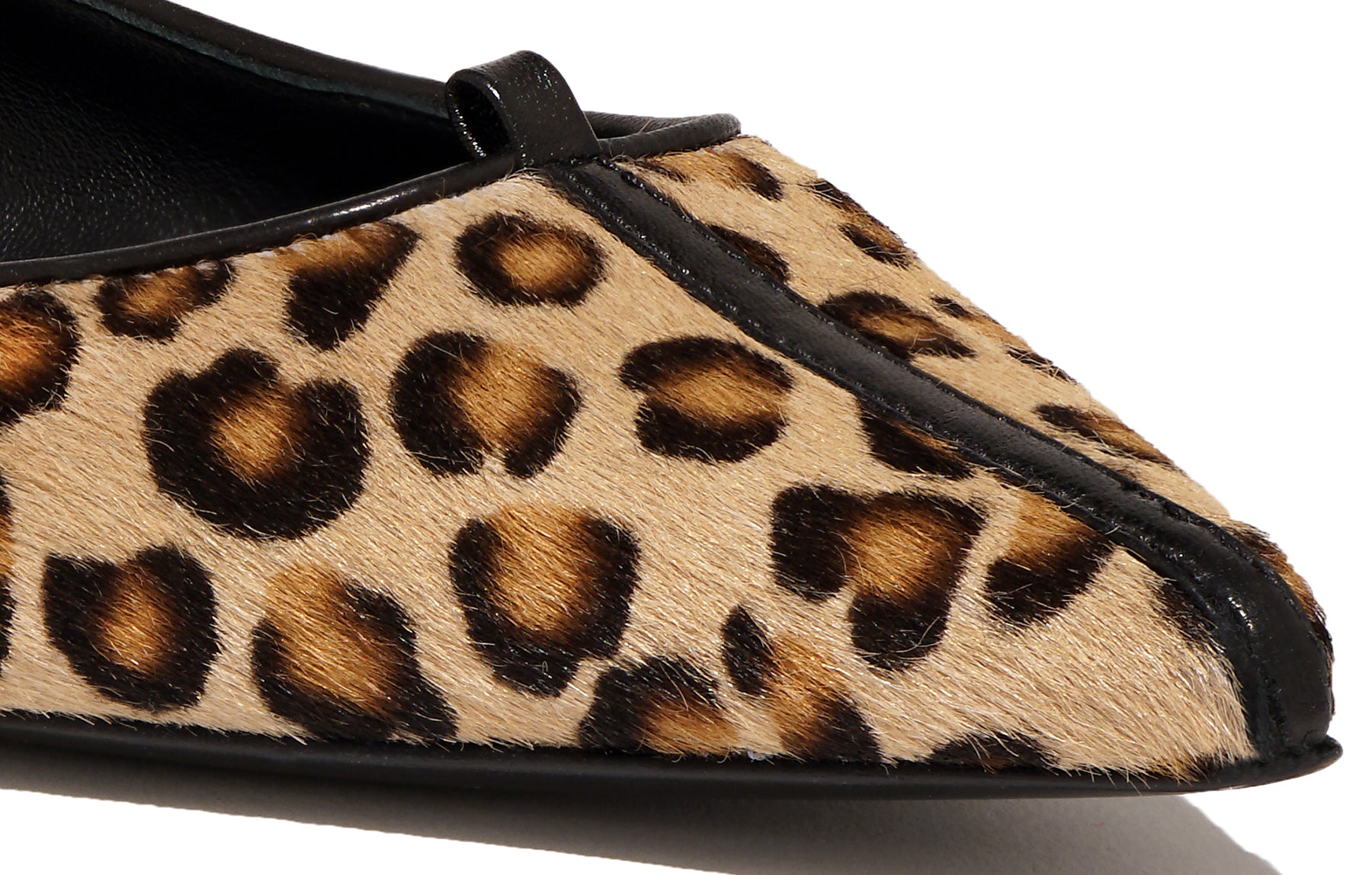 Angled view of Isabella Kron Julie Flat Cavallino in Kamari pony hair, showing toe, textured silhouette, and refined artisanal finish