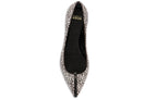 Close-up of natural raffia weave, stitched trim, and cushioned insole branding on Isabella Kron Julie Flat Kasba