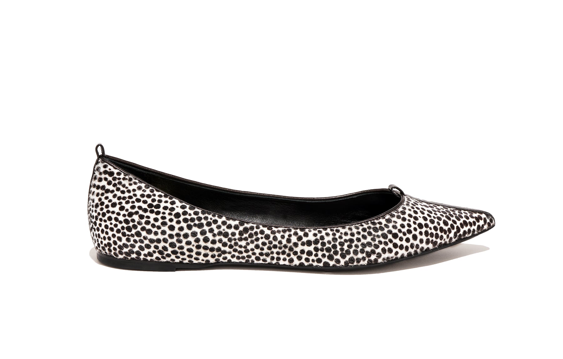 Side view of Isabella Kron Julie Flat in Kasba raffia, highlighting flat sole, soft profile, and artisanal woven detail