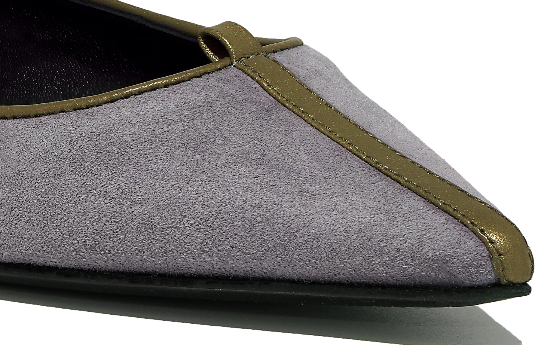 Angled view of Isabella Kron Julie Flat in crepuscolo gray suede, showing rounded toe, clean silhouette, and subtle elegance
