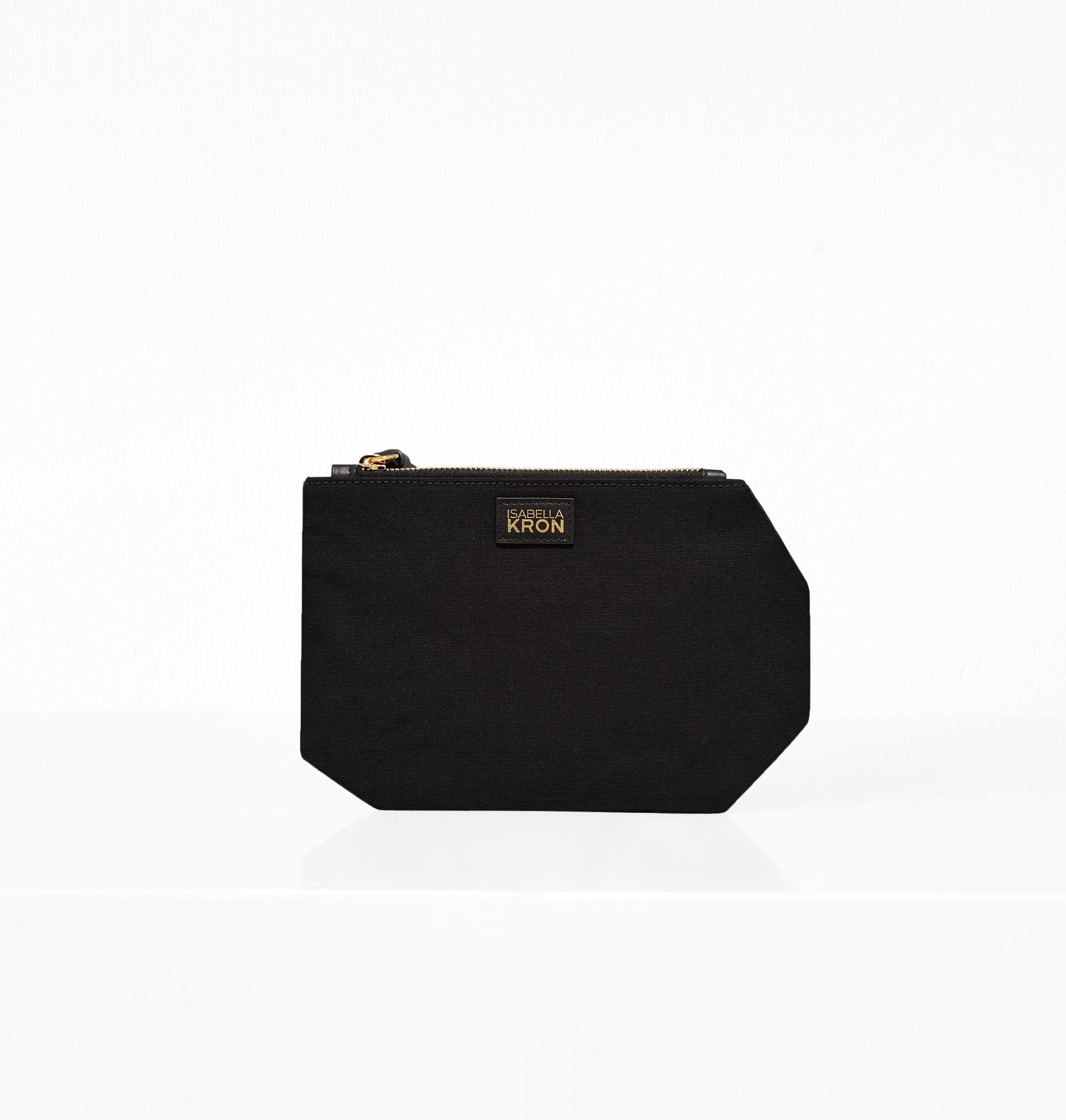 Back profile of K Clutch in Black Canvas – clean silhouette and sharp lines in a timeless black finish