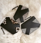 Alternate angle of K Clutch in Black Suede – refined clutch with modern, versatile silhouette
