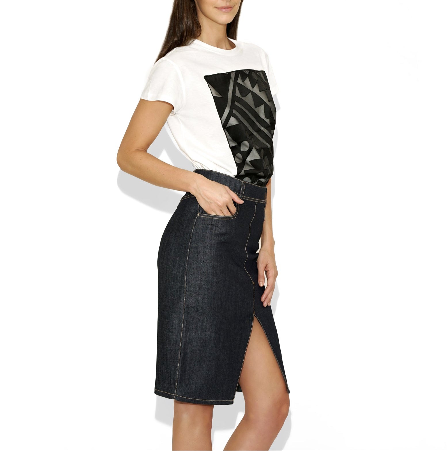 Full-body model view wearing Isabella Kron Kate Skirt in denim, styled with tucked-in t-shirt to highlight casual A-line fit and clean silhouette