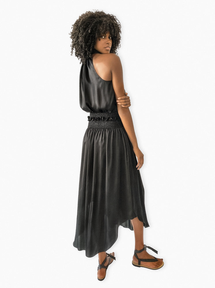 Back view of Lily Silk Skirt in black – refined silhouette with subtle detailing