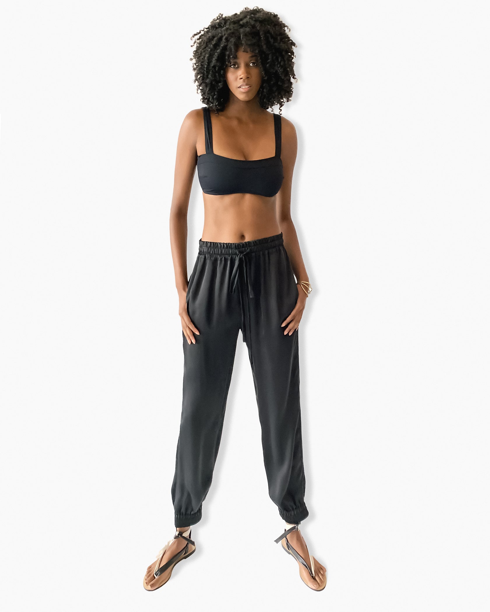 Model wearing Lou Jogger Silk Pant in black – modern and effortless silk joggers
