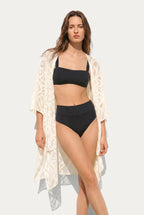 Front view of Isabella Kron Nomad Cover‑Up in ivory, relaxed, open-front beach kimono with wide sleeves