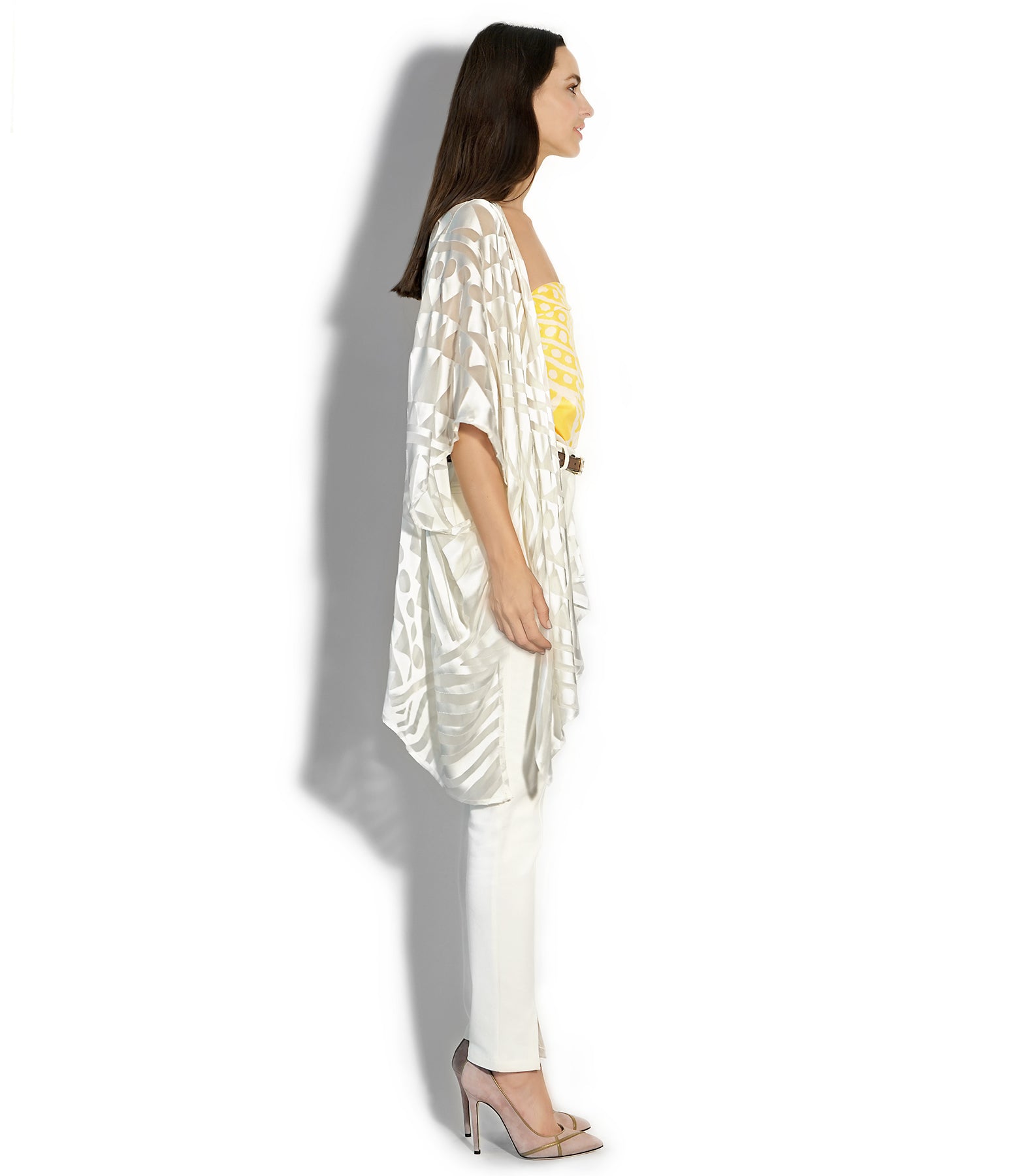 Side view of Isabella Kron Nomad Cover‑Up in ivory, draped silhouette highlighting soft linen fabric and open kimono sleeve