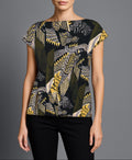 Model wearing Roxanne T-Shirt in Jungle/Black – bold printed tee styled with modern minimalism