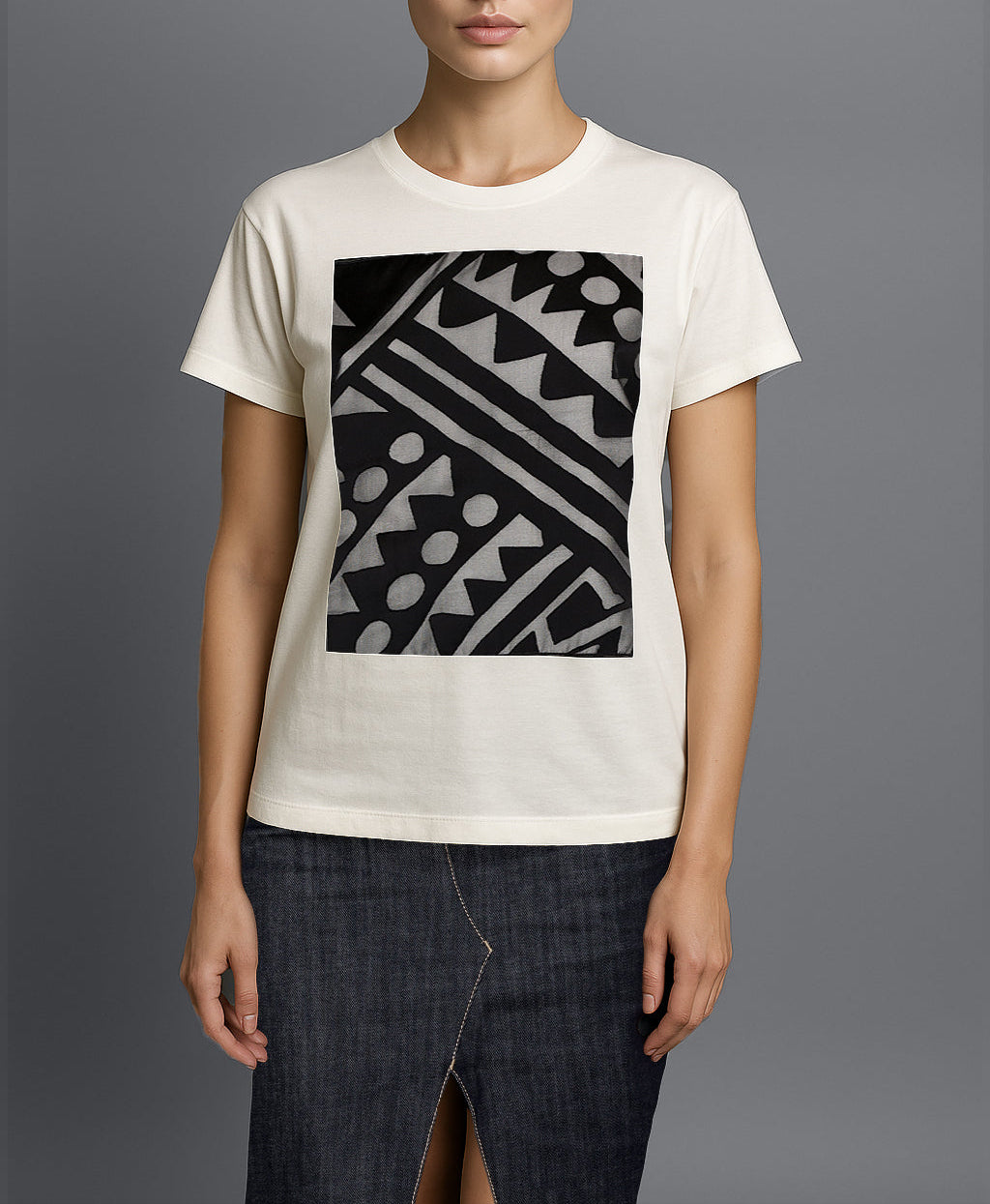 Full‑body model wearing Isabella Kron Rudi Tee, styled with  skirt to show relaxed fit and versatile layering