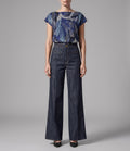 Isabella Kron Soho high-rise wide-leg denim pant styled with a Roxanne top