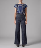 Isabella Kron Soho high-rise wide-leg denim pant styled with a Roxanne top